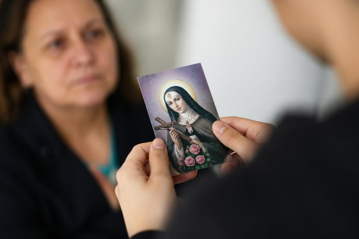 Sharing Saint Rita prayer cards
