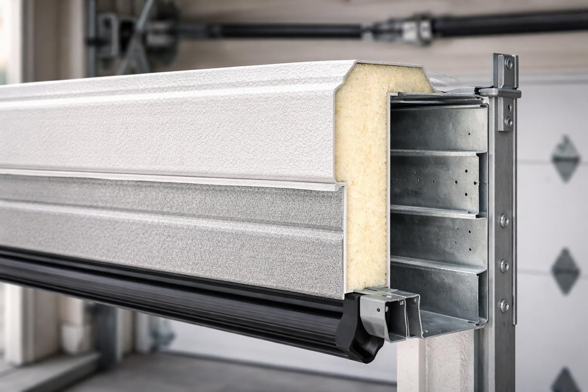 Steel garage door construction layers