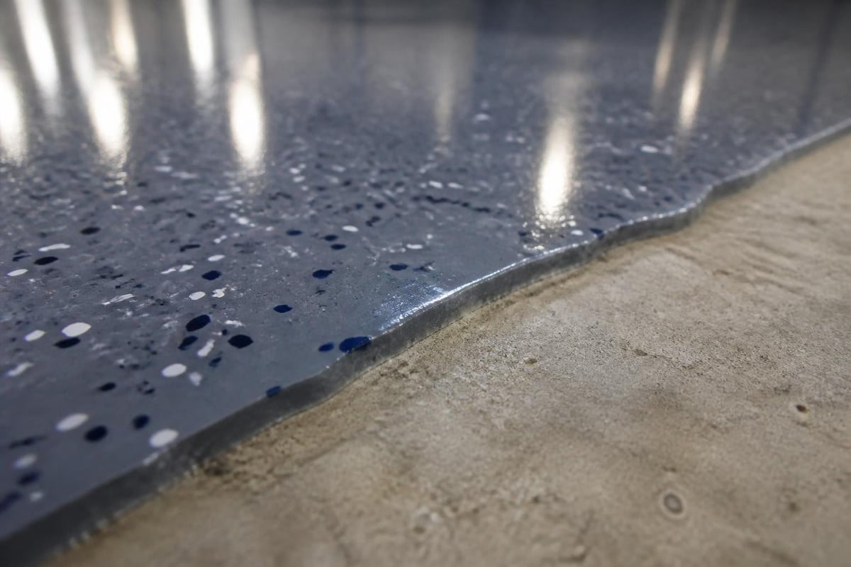 Epoxy polyurethane flooring system layers