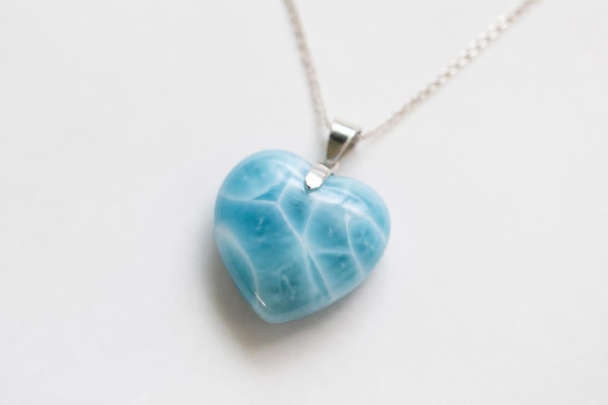 Heart-shaped blue gemstone symbolism