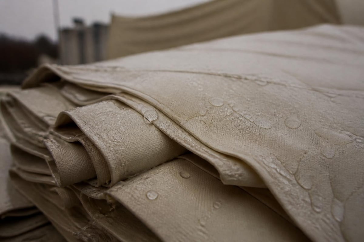 Canvas treatment processes