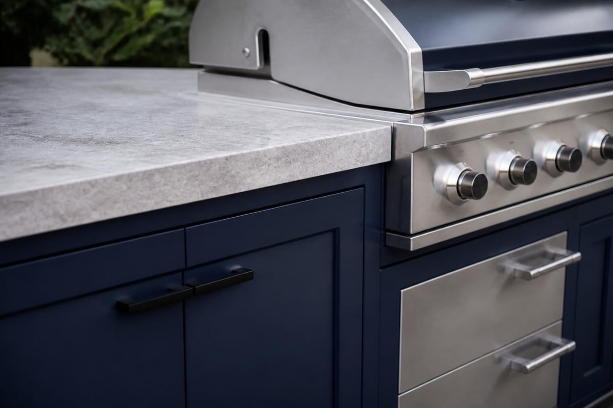 Outdoor cooking station material layers