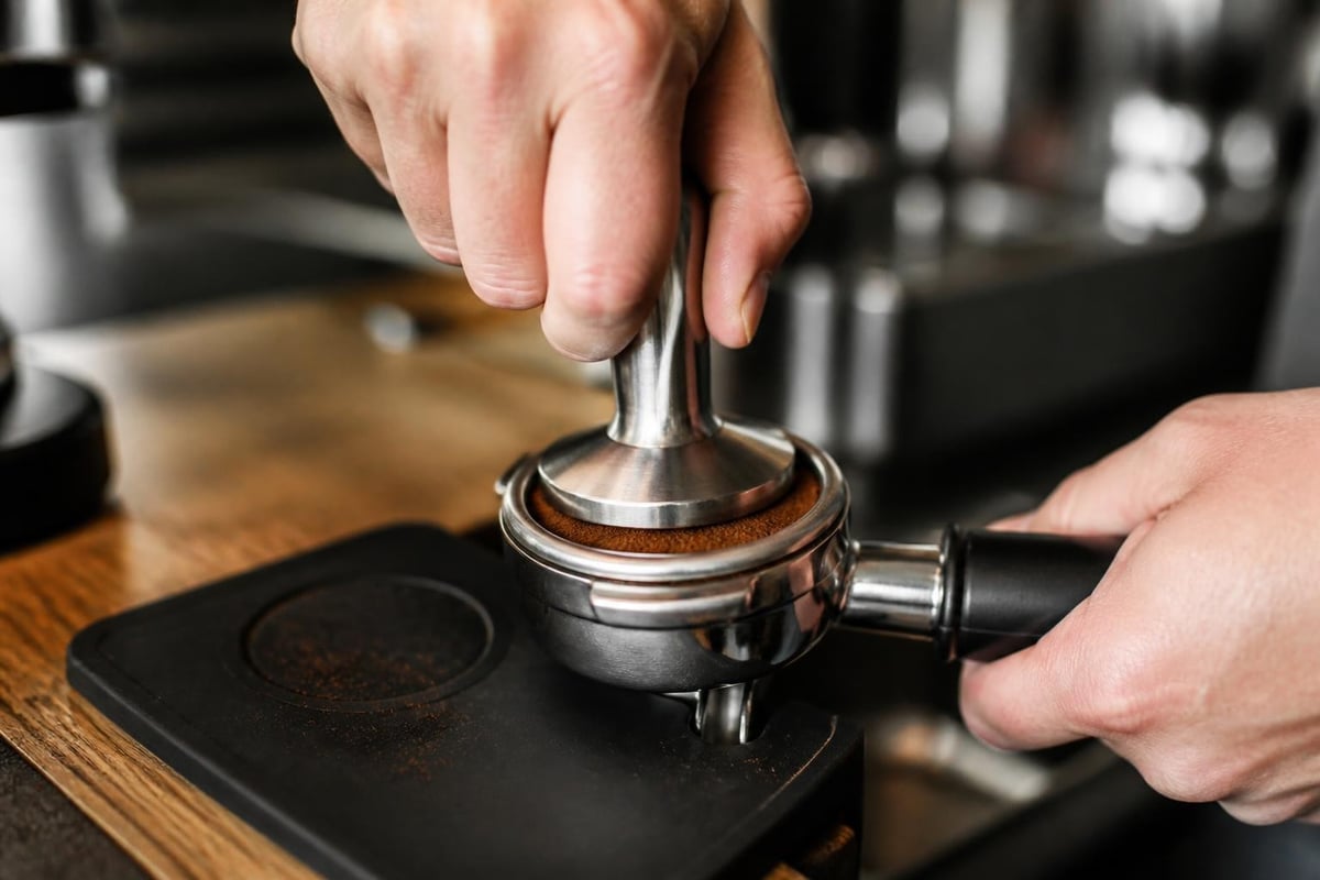 Technique de tassage du café