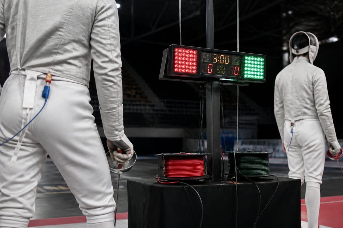 Electronic fencing scoring system setup