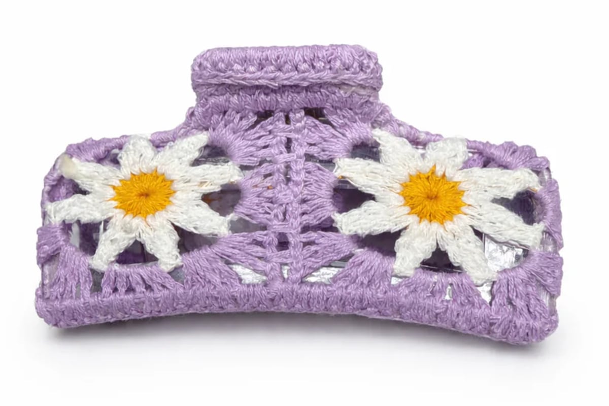 Handmade crochet and embroidered claw clips with textured yarn wrapping and dimensional floral details for long hair styling